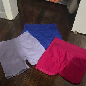 Set of Three Athletic Shorts in Blue, Purple, and Pink
